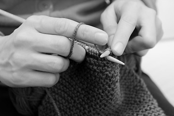 Image showing Closeup of woman knitting with wool