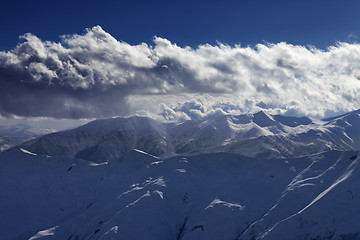 Image showing Evening mountains and sunlight clouds