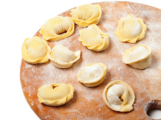 Image showing Homemade ravioli on kitchen wooden board