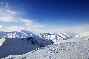 Image showing Snowy mountains at sun day