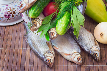 Image showing Fish and components for her preparation: vegetables, spices, par