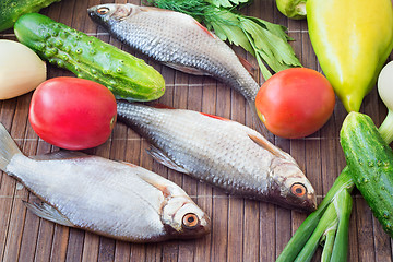 Image showing Fish and components for her preparation: vegetables, spices, par