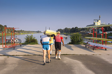 Image showing Four rowers wear ship