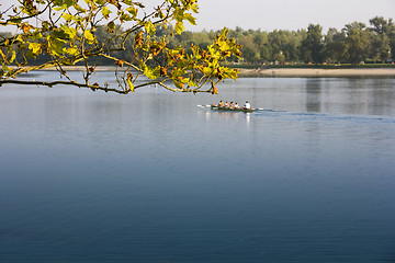 Image showing Rowing in the calm lake