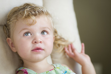 Image showing Adorable Blonde Haired and Blue Eyed Little Girl in Chair