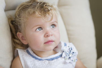 Image showing Adorable Blonde Haired and Blue Eyed Little Girl in Chair