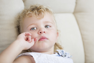 Image showing Adorable Blonde Haired and Blue Eyed Little Girl in Chair