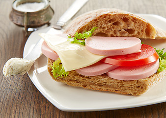 Image showing sandwich with sausage and tomato