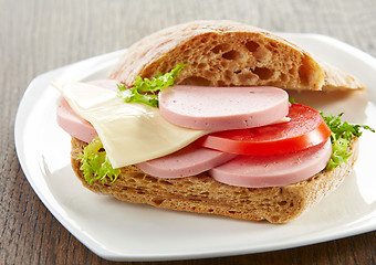 Image showing sandwich with sausage and tomato