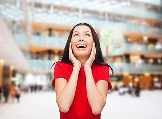 Image showing smiling woman in red dress