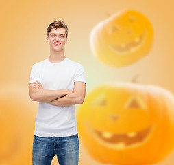 Image showing smiling young man in blank white t-shirt