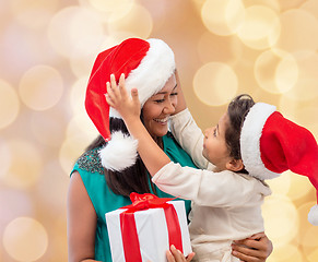 Image showing happy mother and child girl with gift box