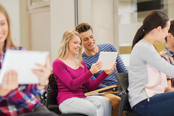 Image showing group of smiling students with tablet pc