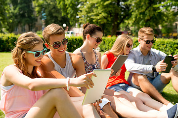 Image showing smiling friends with tablet pc making selfie