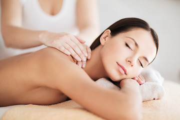 Image showing beautiful woman in spa having massage