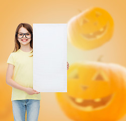 Image showing smiling little girl with white board