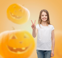 Image showing smiling little girl in white blank t-shirt