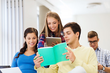 Image showing group of smiling students with tablet pc