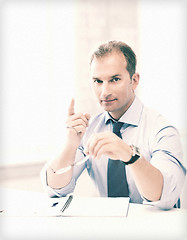 Image showing businessman showing warning gesture