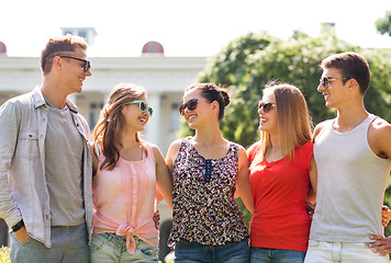 Image showing group of smiling friends outdoors