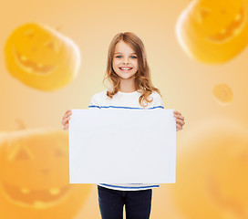 Image showing smiling little girl with white board