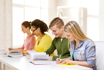 Image showing students with textbooks and books at school