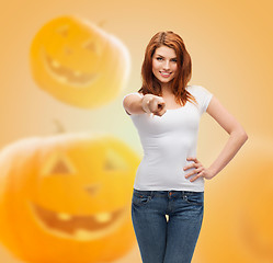 Image showing smiling young woman in blank white t-shirt