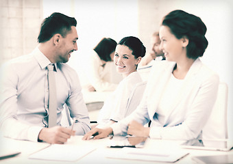 Image showing business team discussing something in office