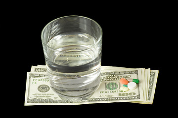 Image showing Pills and money

