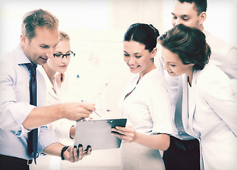 Image showing business team discussing something in office