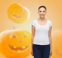 Image showing smiling young woman in blank white t-shirt