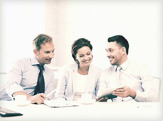 Image showing business team having fun with tablet pc in office