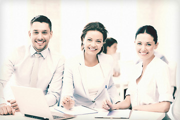 Image showing business team discussing something in office