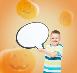 Image showing smiling little boy holding big white text bubble