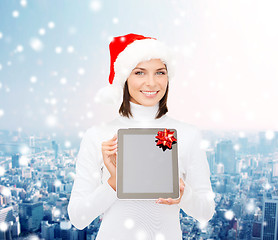 Image showing woman in santa helper hat with tablet pc