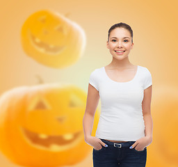 Image showing smiling young woman in blank white t-shirt