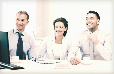 Image showing business team discussing something in office