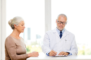 Image showing senior woman and doctor meeting