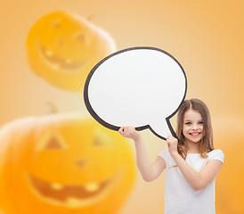 Image showing smiling little girl holding big white text bubble