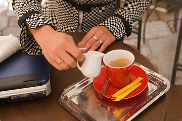 Image showing Preparing coffee latte