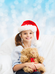 Image showing smiling little girl with teddy bear