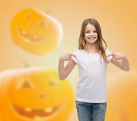 Image showing smiling little girl in white blank t-shirt