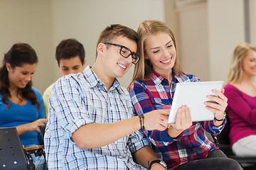 Image showing group of smiling students with tablet pc