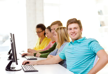 Image showing male student with classmates in computer class