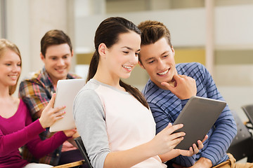 Image showing group of smiling students with tablet pc