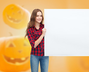 Image showing smiling teenage girl with white board