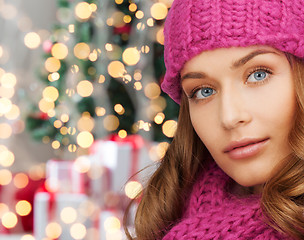 Image showing close up of smiling young woman in winter clothes