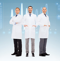 Image showing group of smiling male doctors in white coats