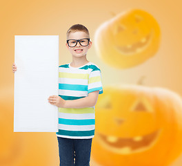 Image showing smiling little boy with white board