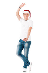 Image showing Young man in Santa hat